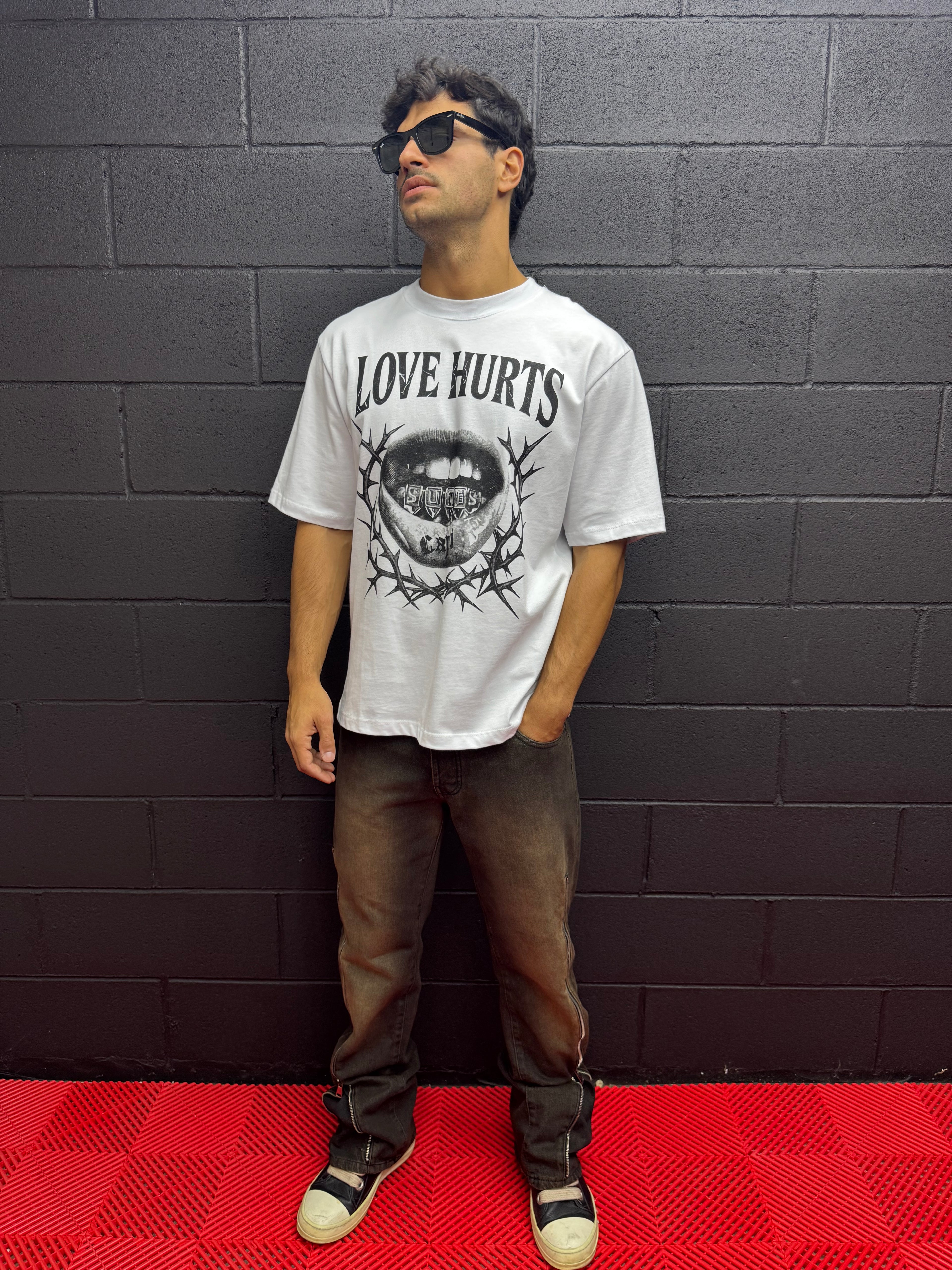 LOVE HURTS