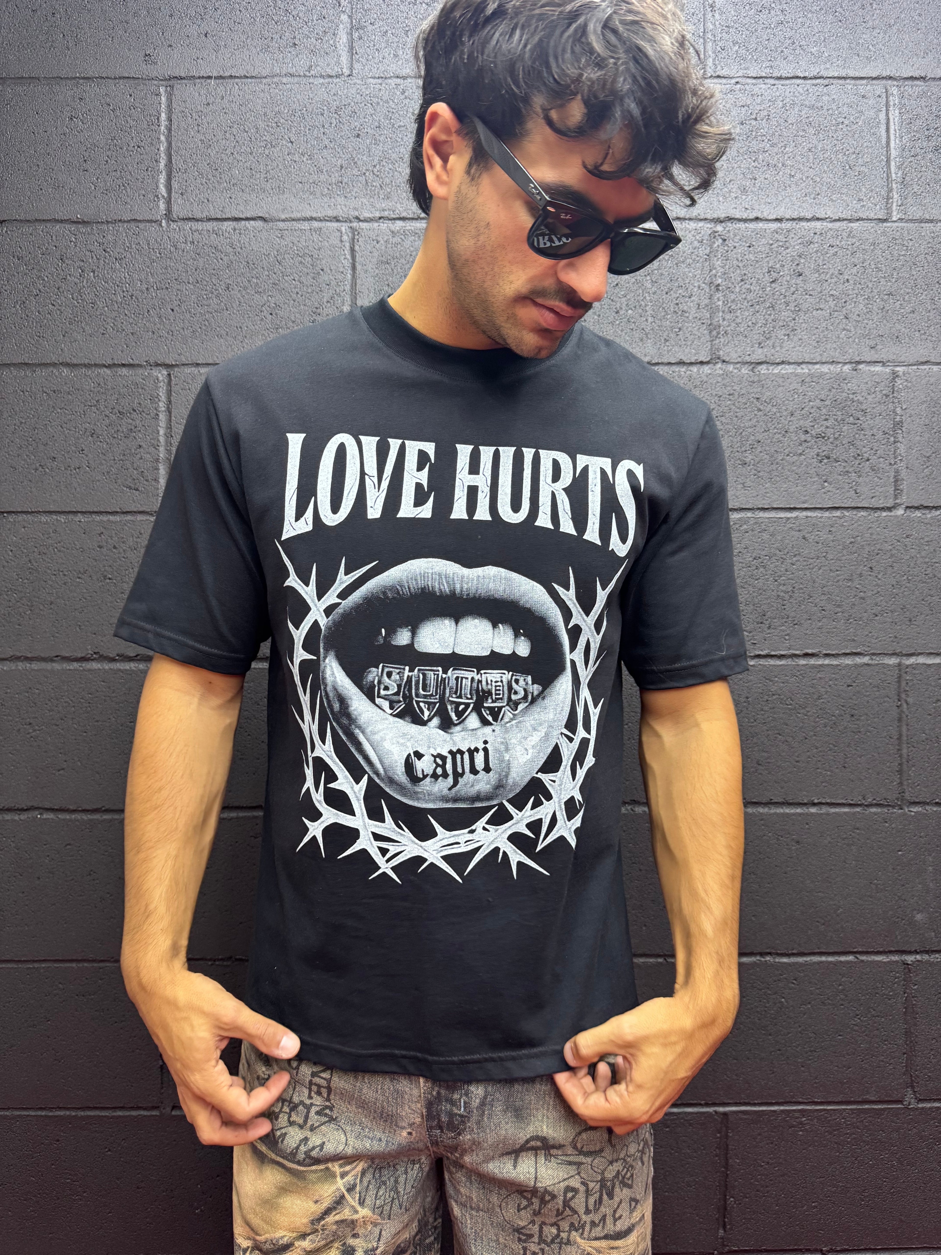 LOVE HURTS
